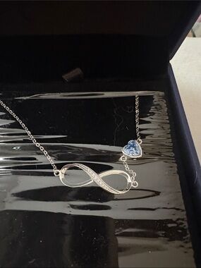 Swarovski Silver Infinity Necklace with Blue Heart Crystal